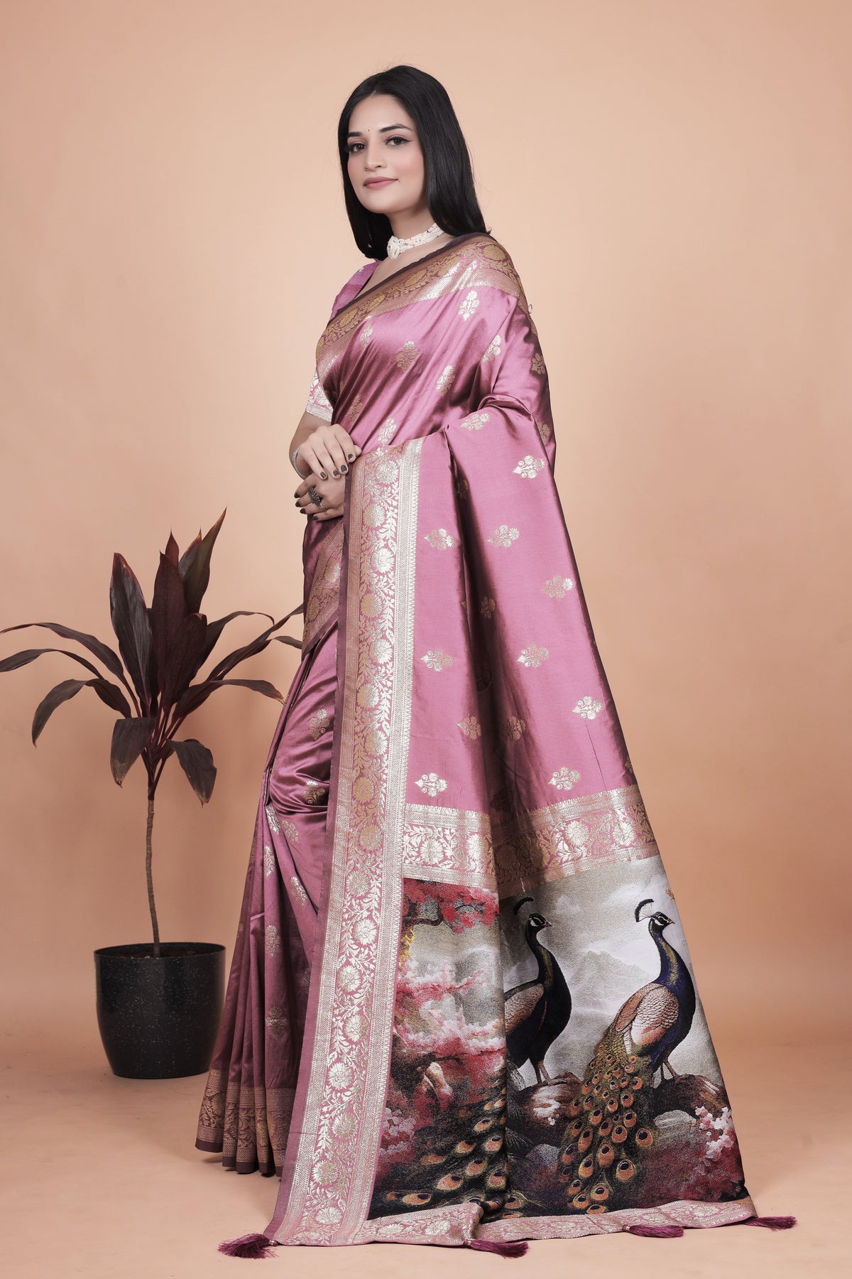 Graceful Lilac Saree with Intricate Golden Border and Peacock Art