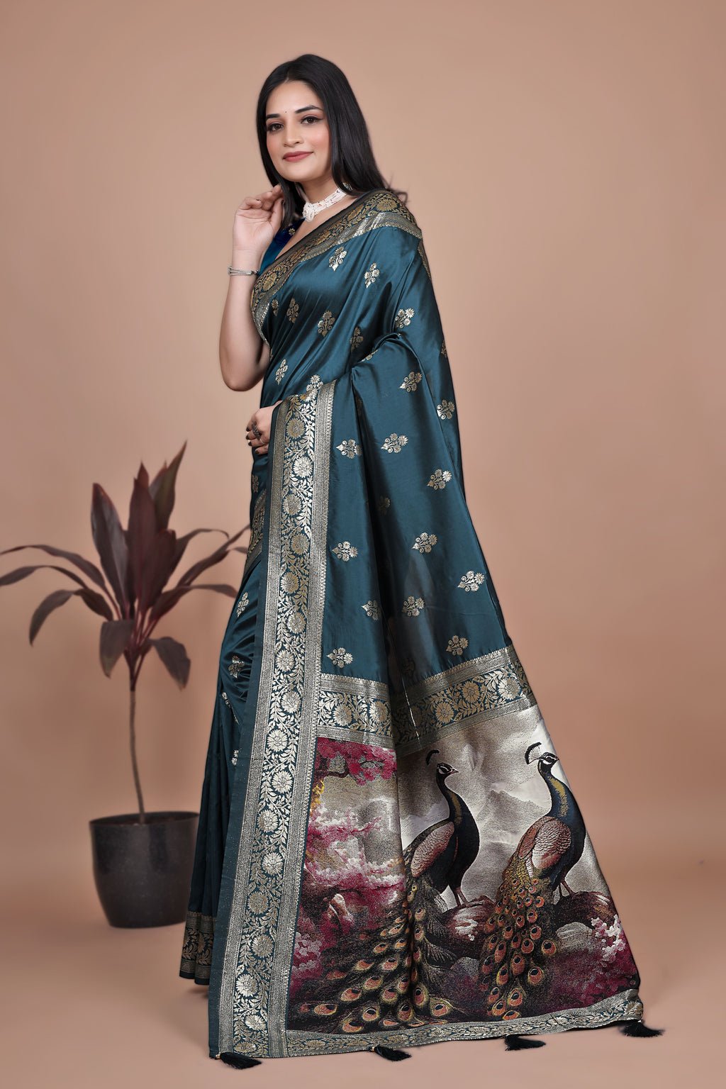 Graceful Teal Saree with Peacock Border and Silver Zari for Weddings & Festivals