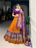 Ethnic Yellow & Purple Lehenga Choli with Tassels & Patola Print