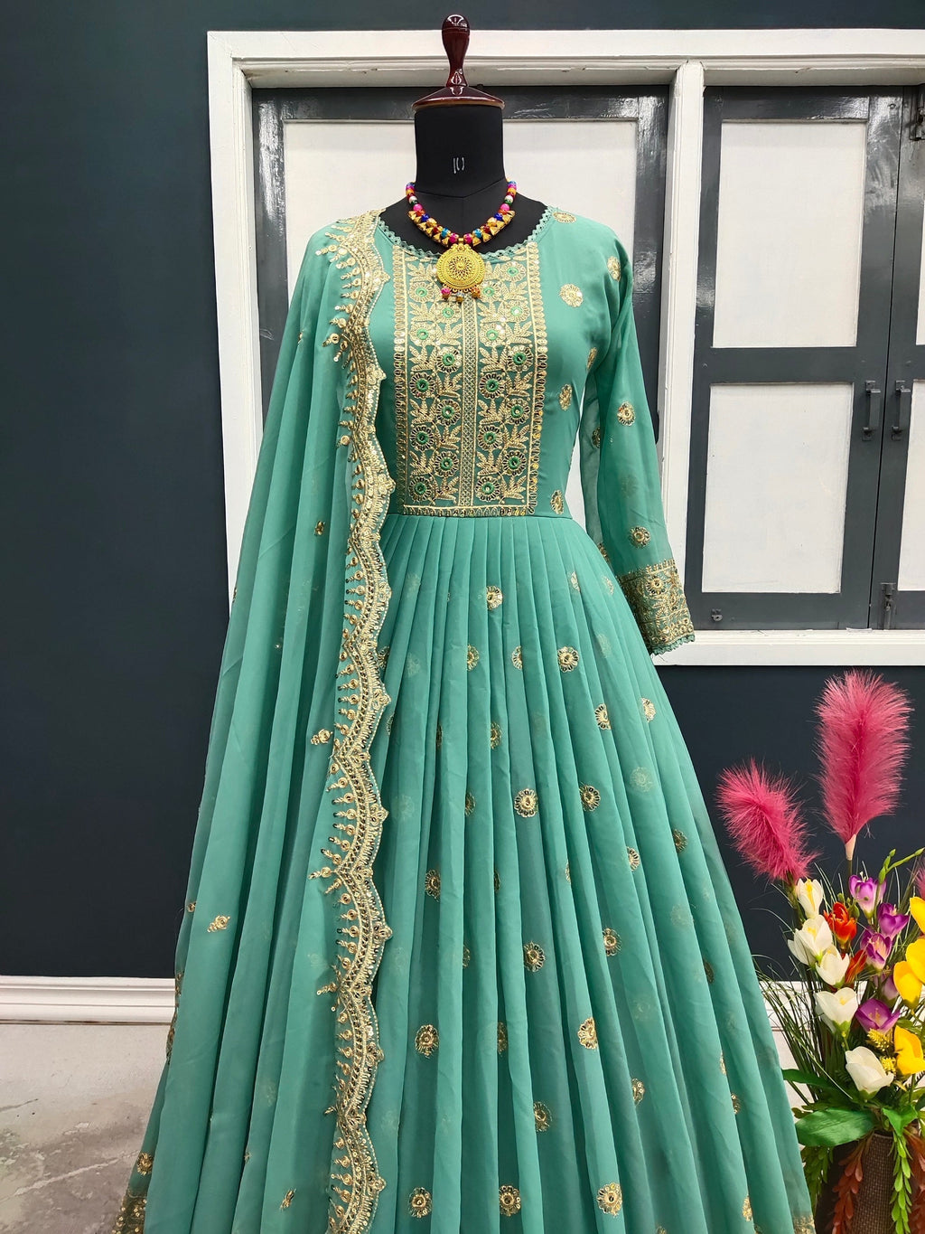 Designer Pista Green Color Embroidery Work Gown