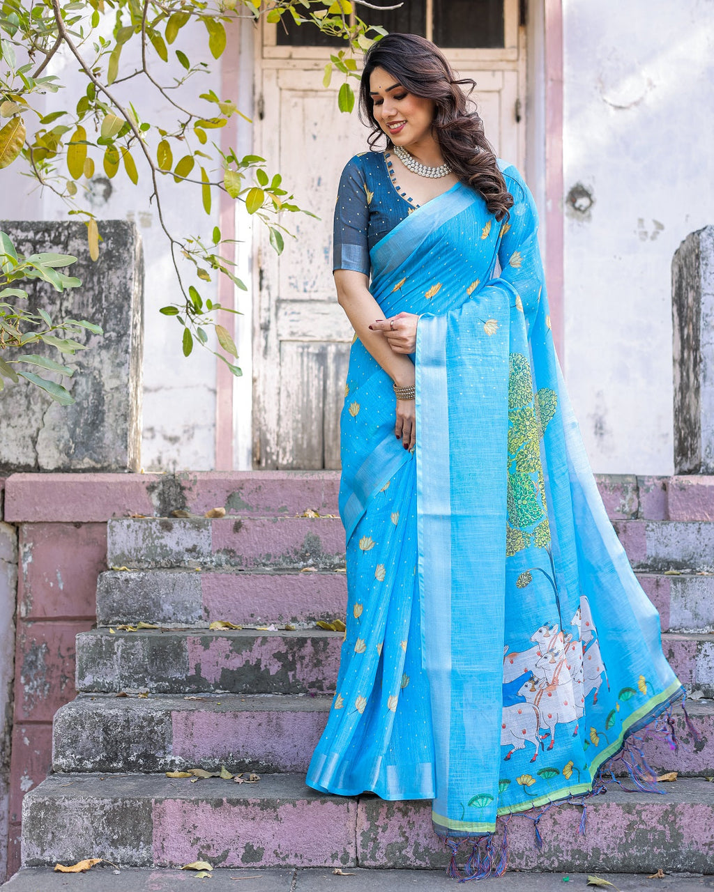 Elegant Sky Blue Linen Saree with White Lotus Print & Silver Zari Border