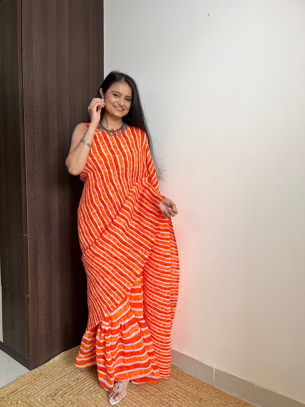 Orange Faux Georgette Crushed Saree Gown