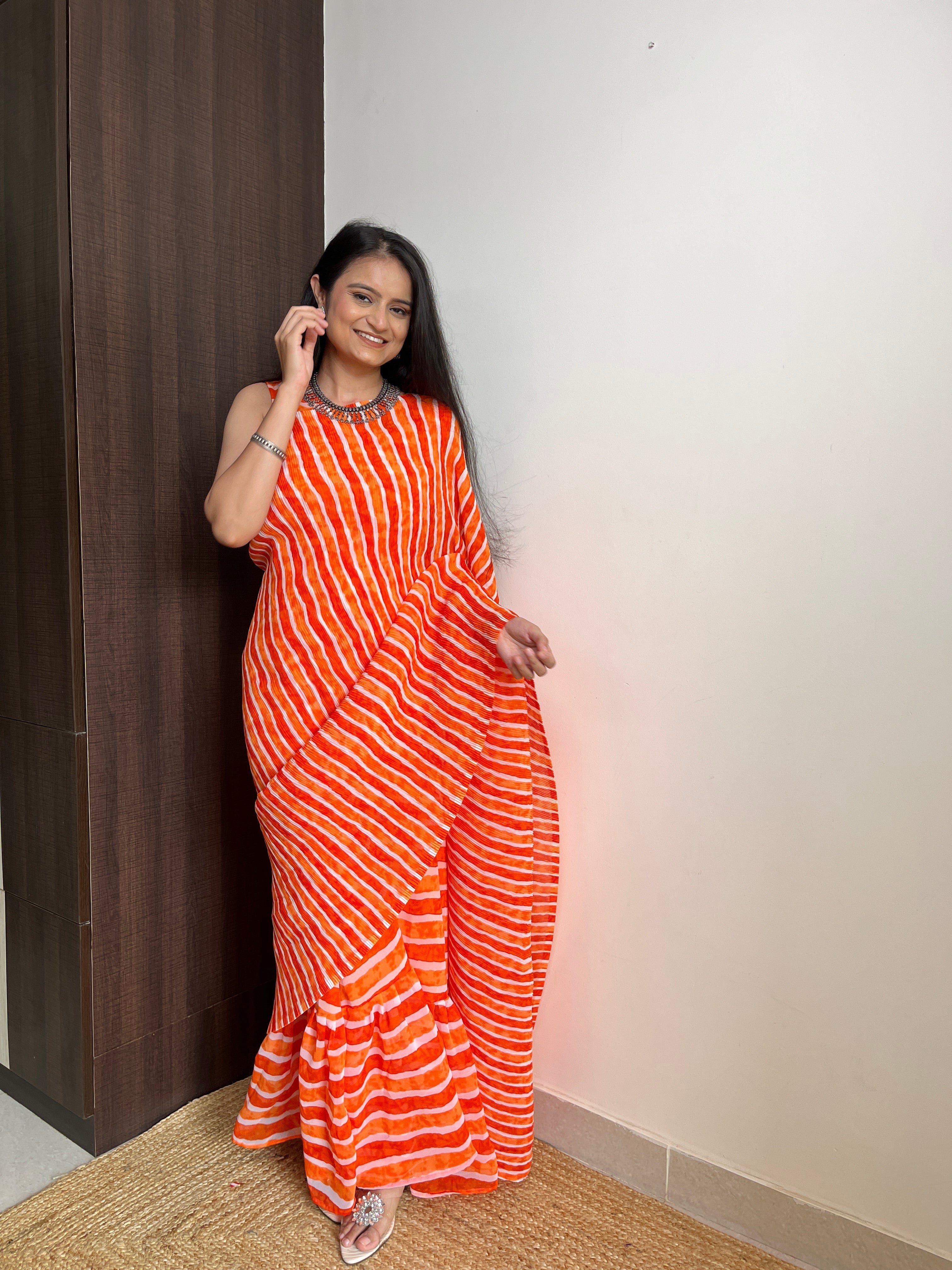 Orange Faux Georgette Crushed Saree Gown
