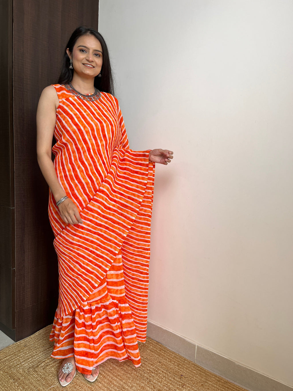 Orange Faux Georgette Crushed Saree Gown