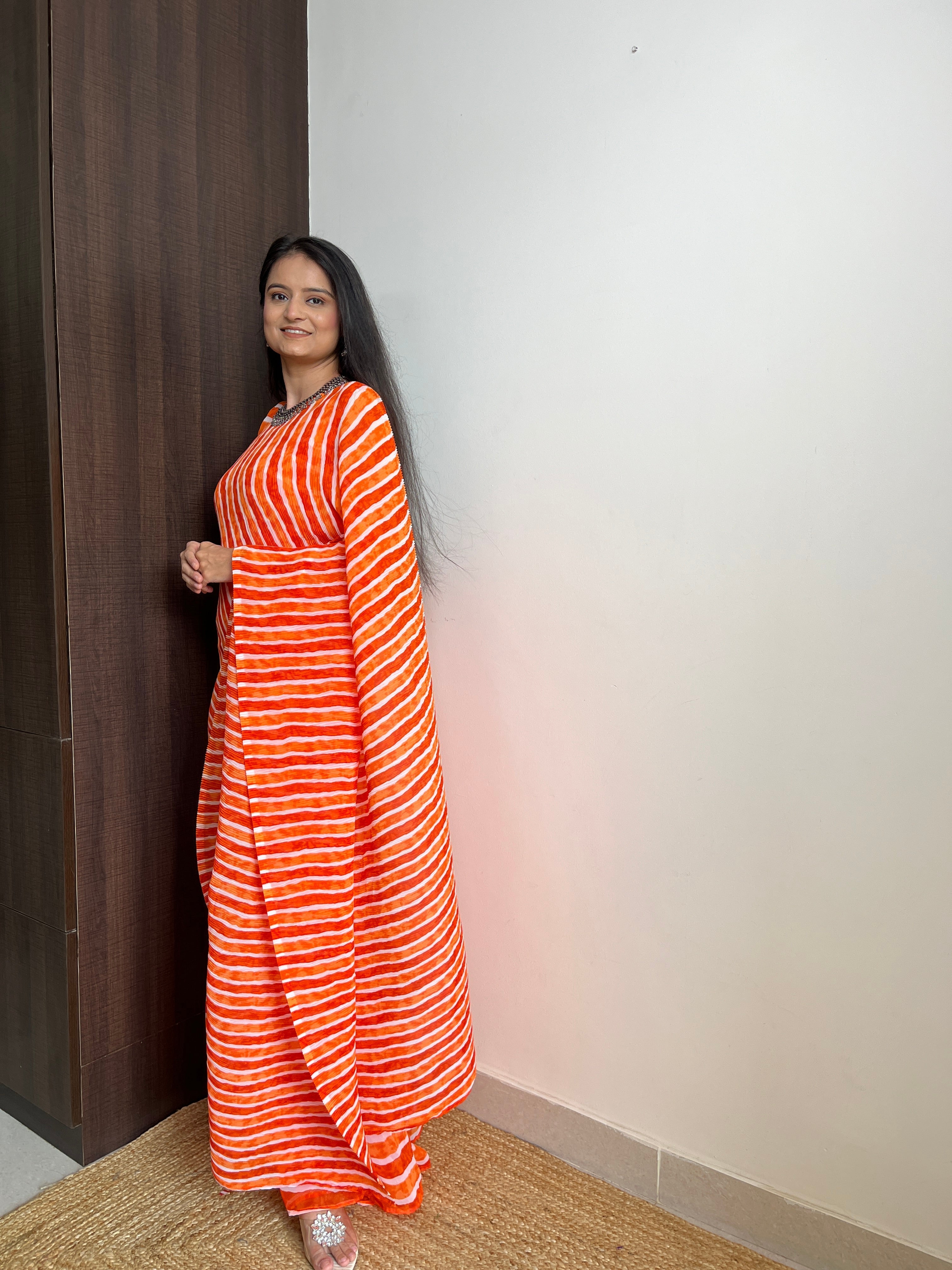 Orange Faux Georgette Crushed Saree Gown