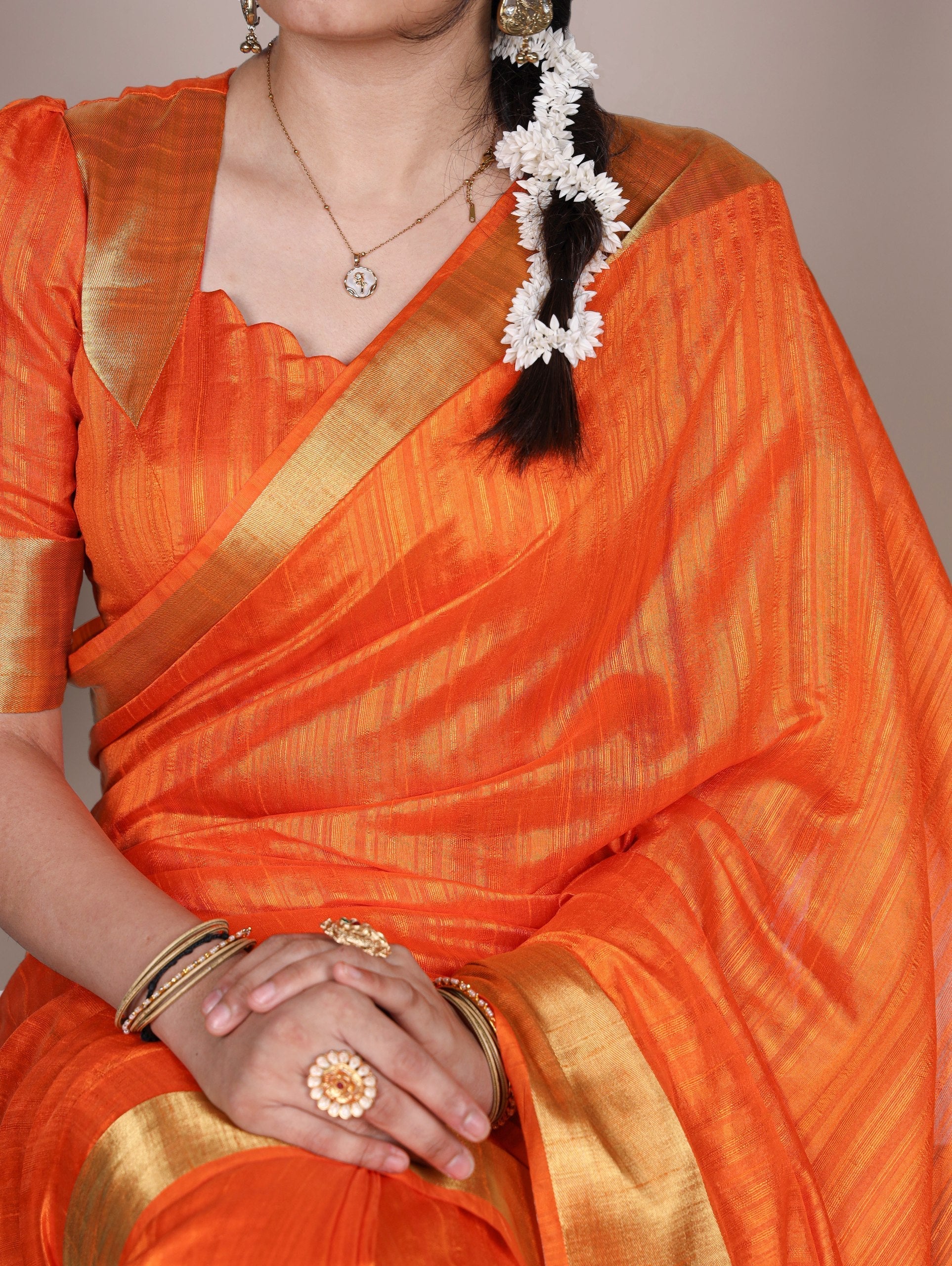 Orange Elegant Raw Silk Saree with Zari Weaving Work