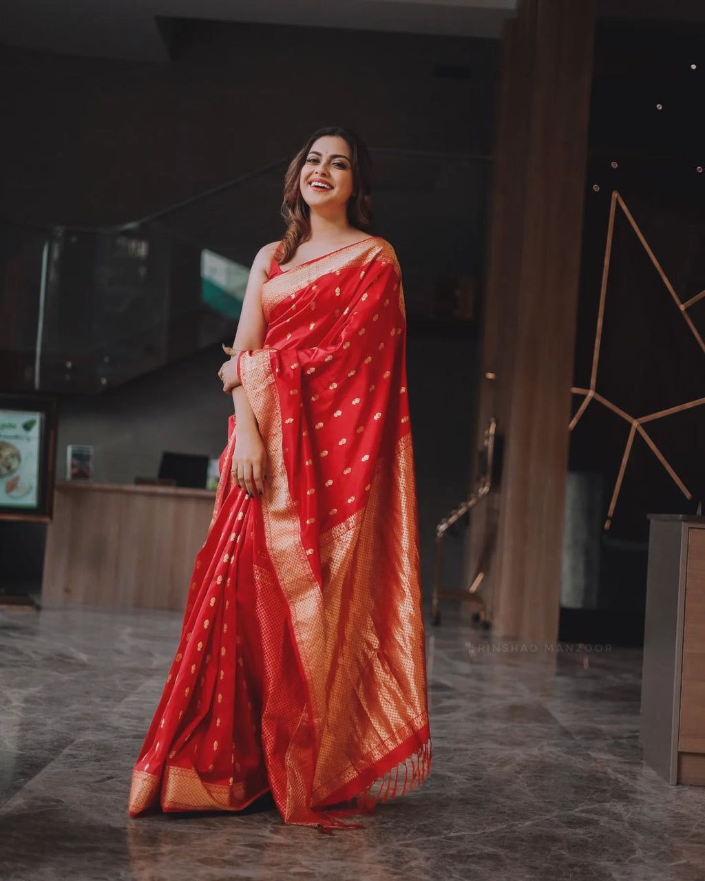 Cynosure Red Soft Banarasi Silk Saree With Demesne Blouse Piece