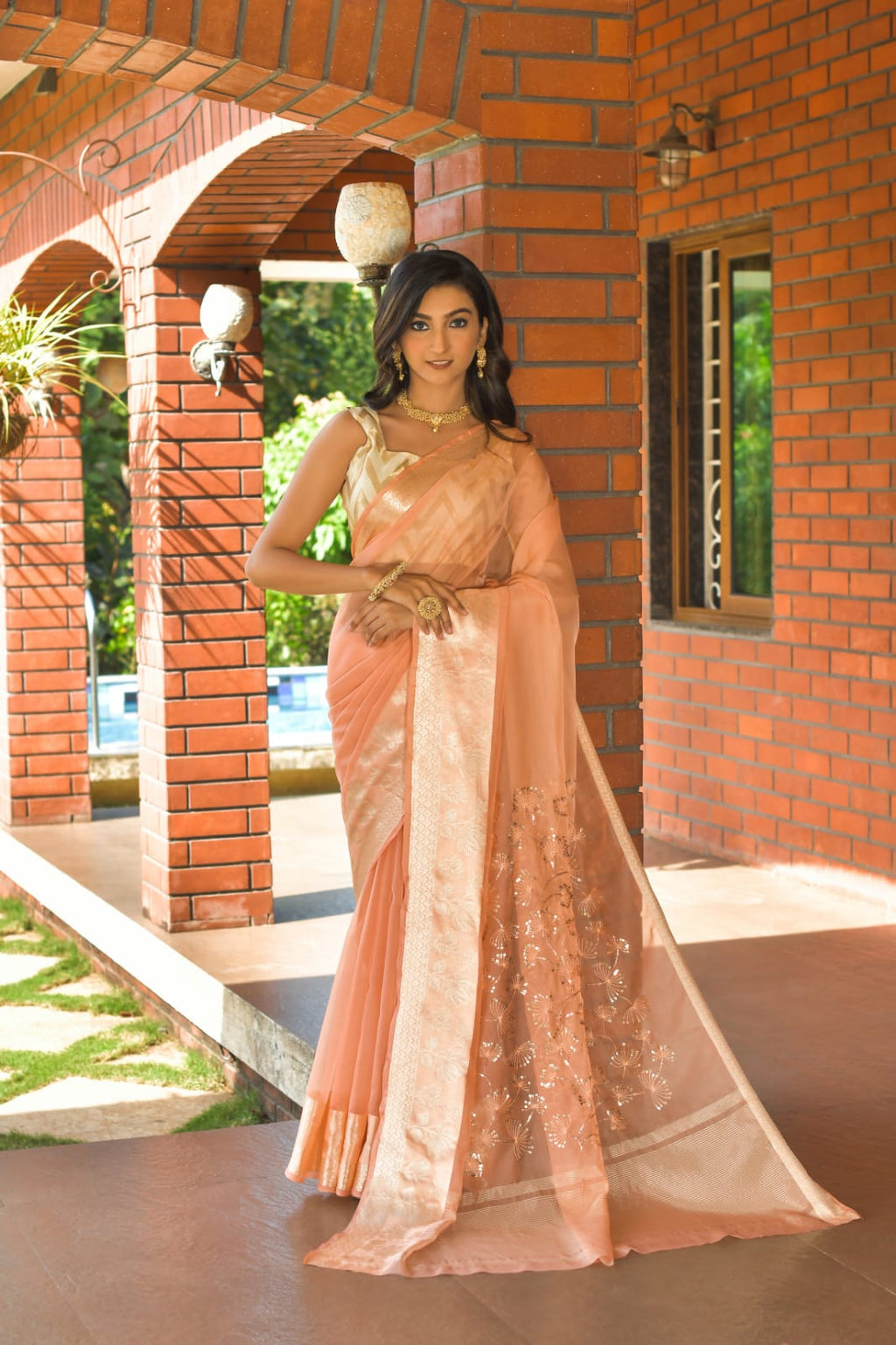 Orange color Pure Organza Saree with Jacquard Blouse