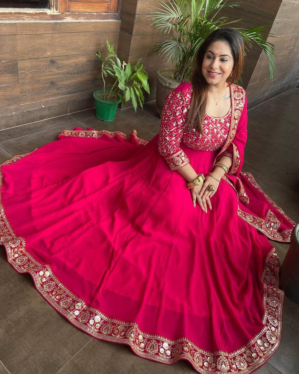 Presenting Dark Pink Color With Work Georgette Gown