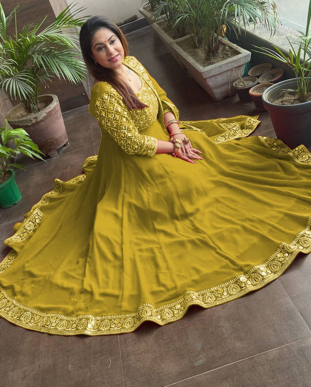 Presenting Yellow Color with Work Georgette Gown