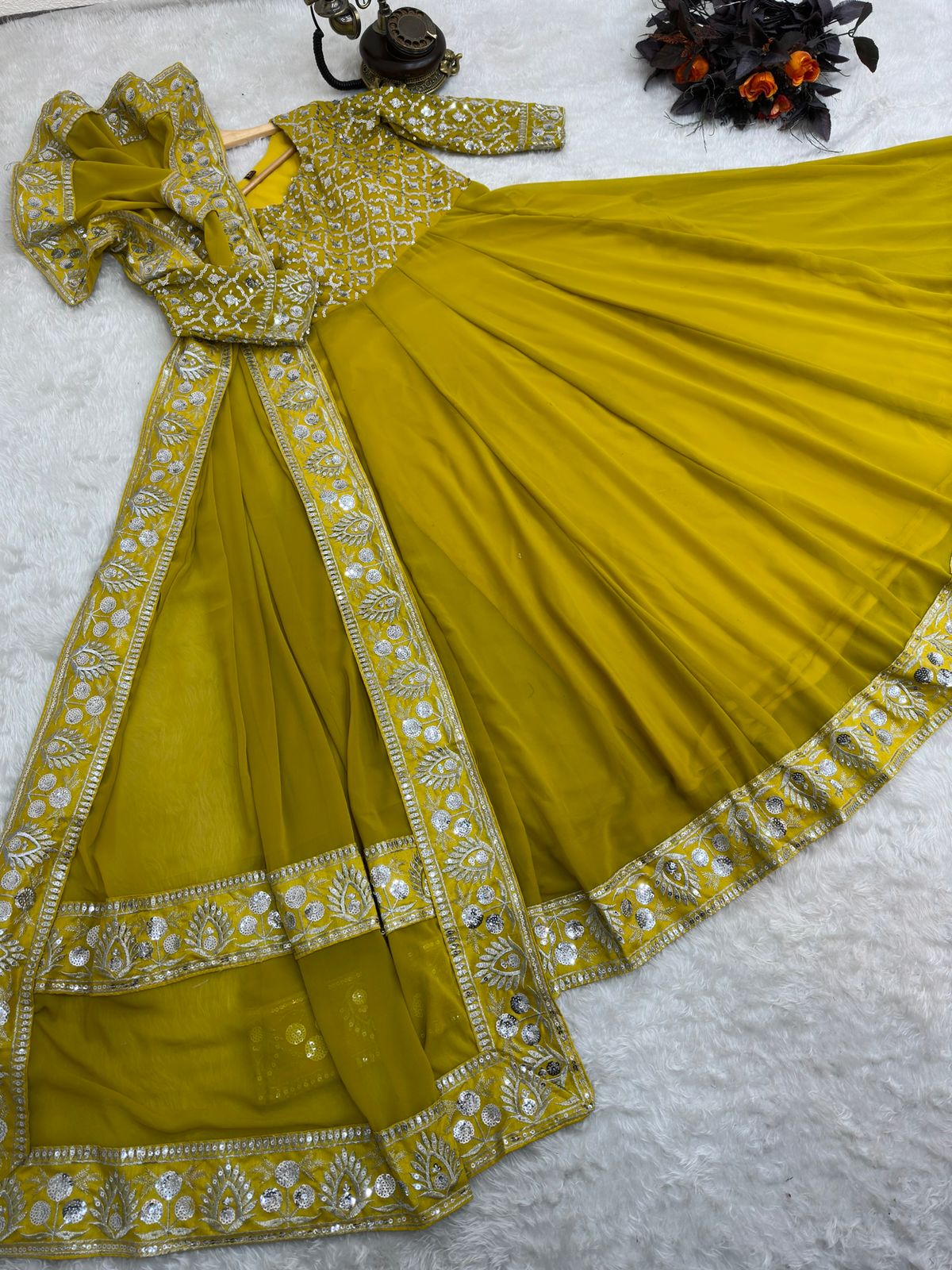 Presenting Yellow Color with Work Georgette Gown