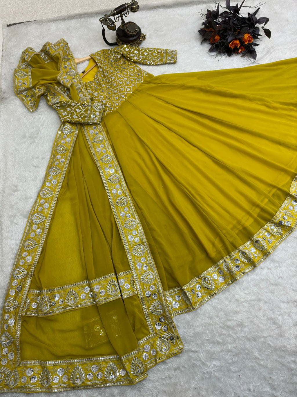 Presenting Yellow Color with Work Georgette Gown