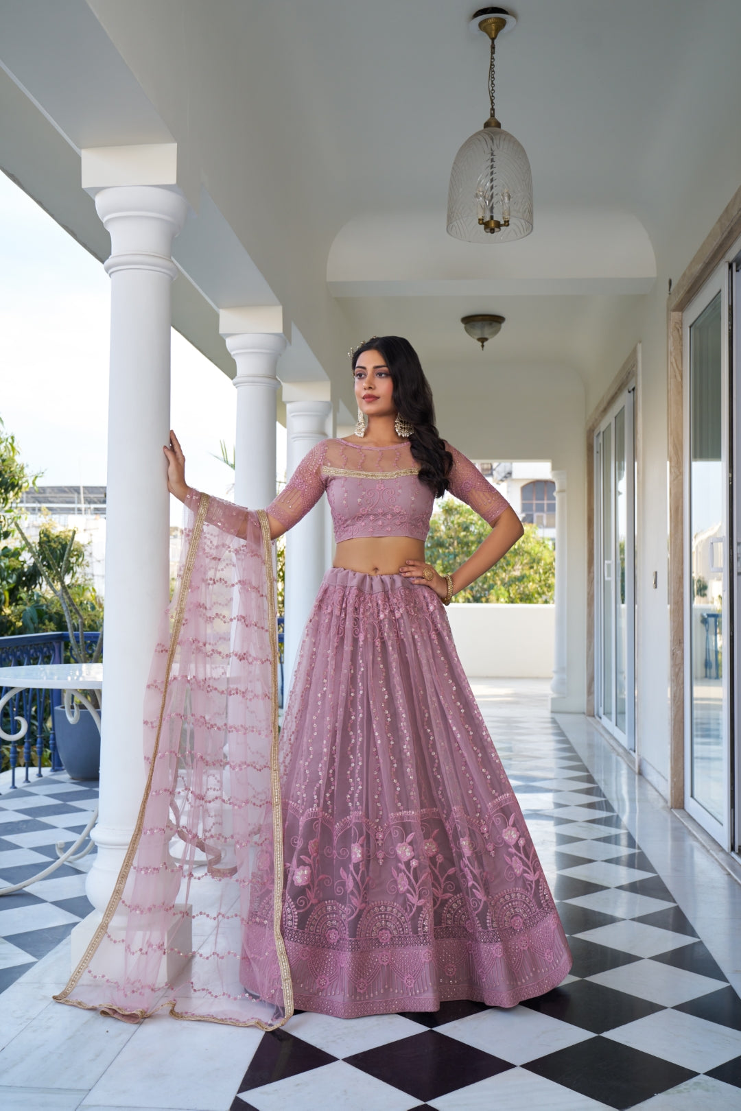 Dusty Pink Elegant Butterfly Net Lehenga with Intricate Embroidery