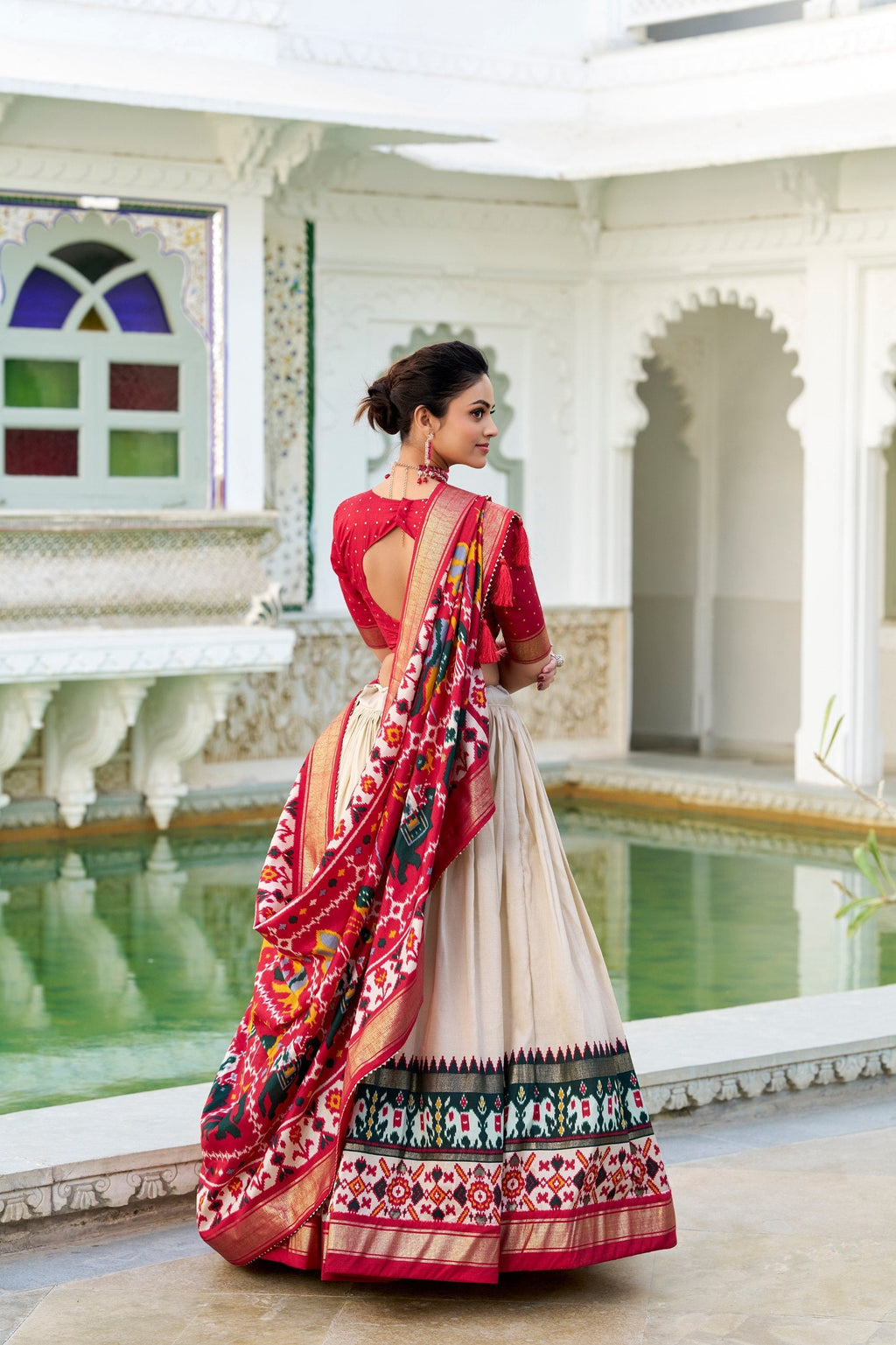 Mediashor Cream Patola Lehenga Choli with Red Banarasi Dupatta