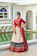 Mediashor Cream Patola Lehenga Choli with Red Banarasi Dupatta