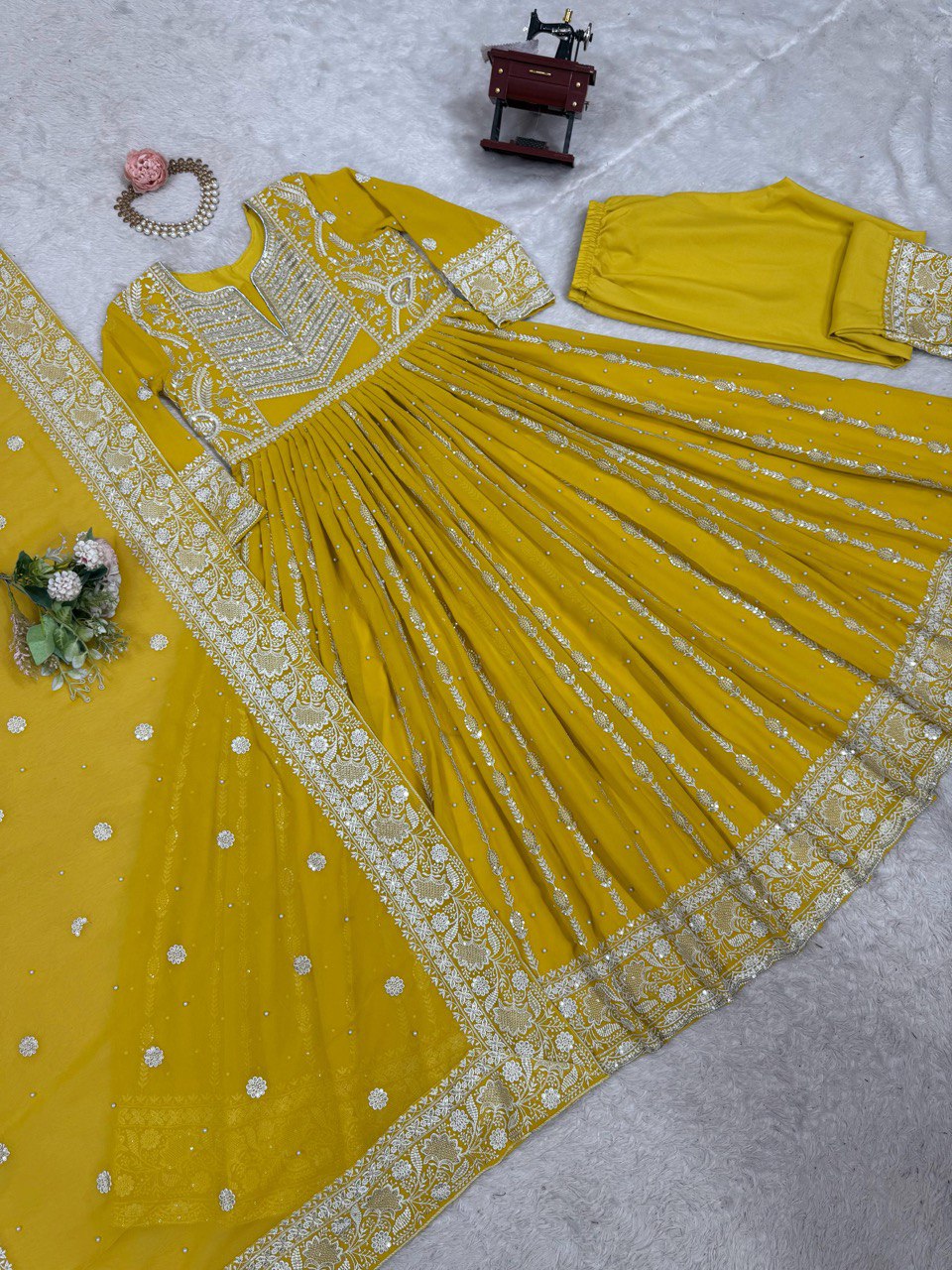 Yellow Elegant Faux Georgette Thread & Sequin Embellished Suit Set with Rivet Moti Detailing